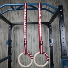IRONLIFE gymnastické kruhy SCHMIDT Gym Wood Ring - Set (dřevo), červený popruh